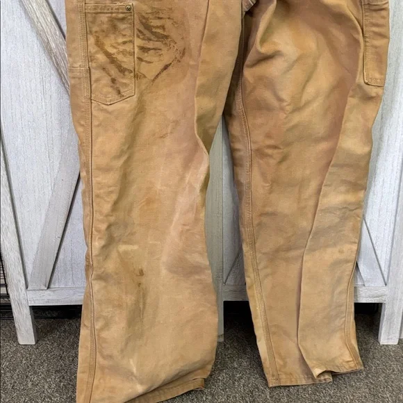 Thrashed vintage 80s or 90s carhartt unlined beige double knee duck overall bibs